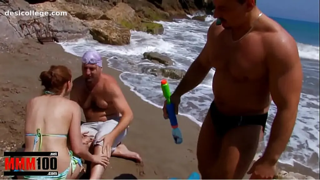 Real Cute girl gets fucked on the beach in a great threesome