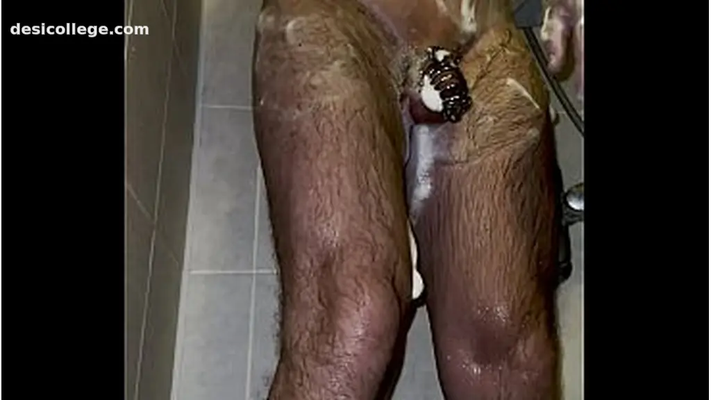 Uncut I& taking a shower with a chastity belt on my penis!