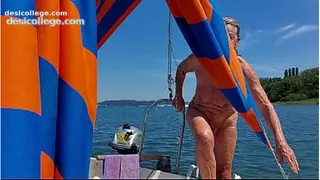 4K A mature woman, completely naked, on a sailboat!