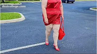 Caught Beautiful woman walking outdoors in public parking lot showing off for strangers