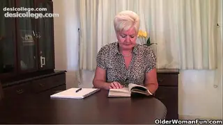 Chubby granny in stockings plays with vibrator