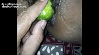 Desi wife eating cucumber