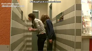 Girl with two braids does blowjob for two guys at the same time