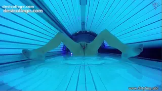 Hidden Spy Cam in Public Tanning Bed
