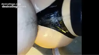 Me fucking my wife& big wet ass in latex strings in shower