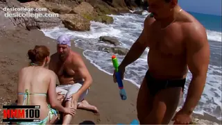 Real Cute girl gets fucked on the beach in a great threesome