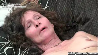 Saggy granny in stockings masturbates hairy pussy